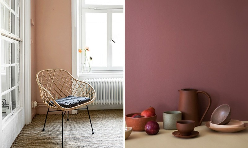 En stol framför en målad vägg och ett stilleben i rosaröda nyanser
